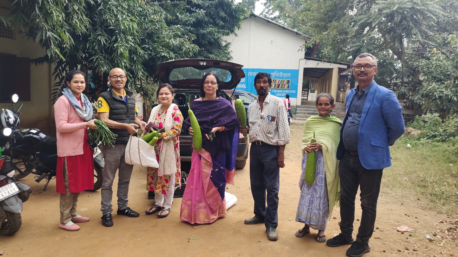 Fresh produce handover with farmers and partners