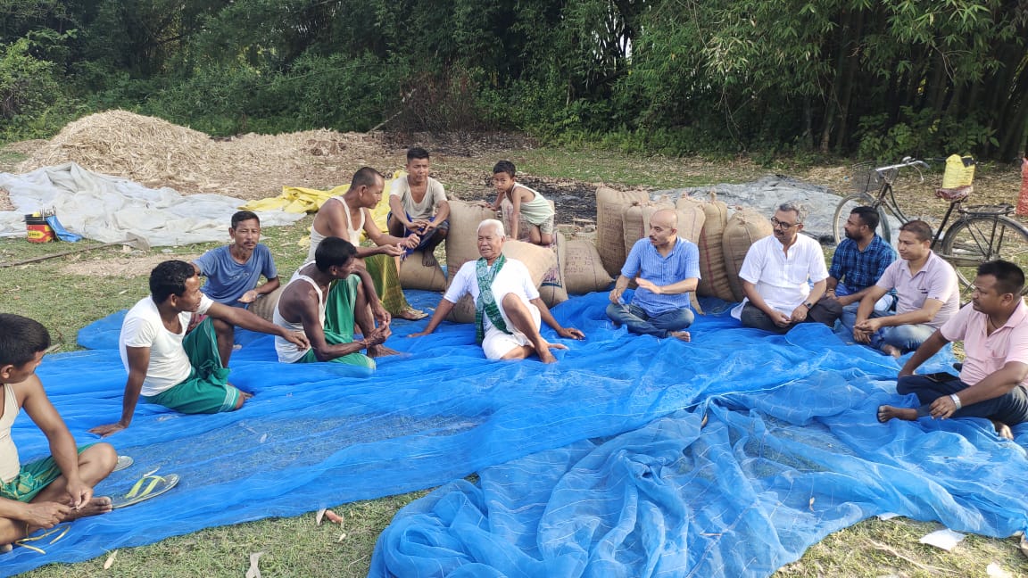 Farmers seated together during a field training session